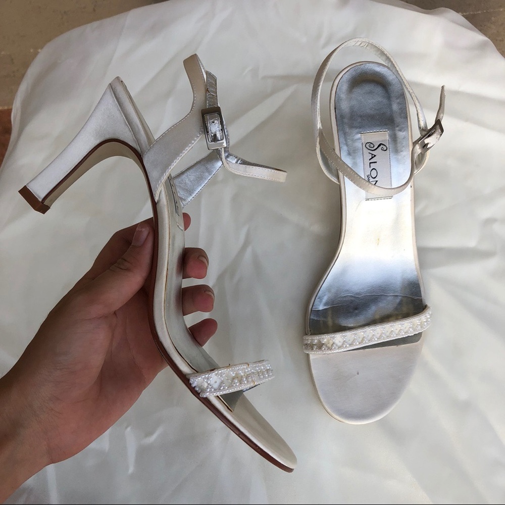 White strappy heels by Salon Shoes in “Capri”
